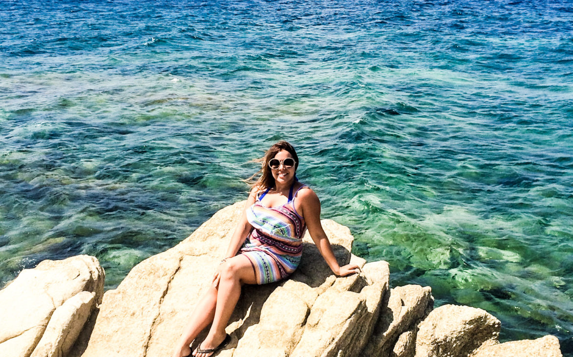 Sitting on rocks in Mykonos